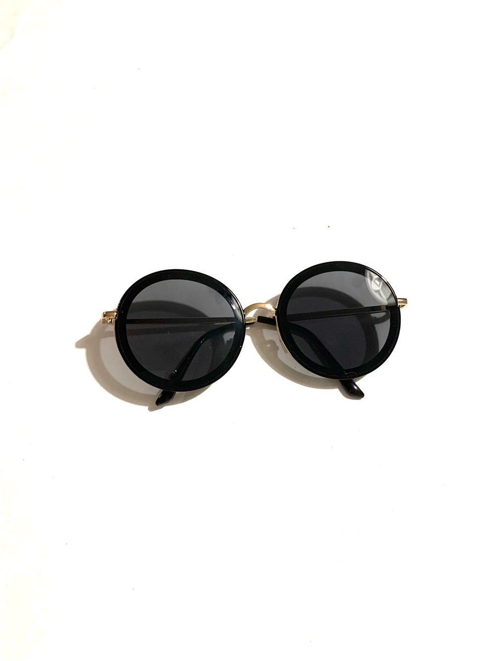 Round Black Sunglasses with Gold Bridge